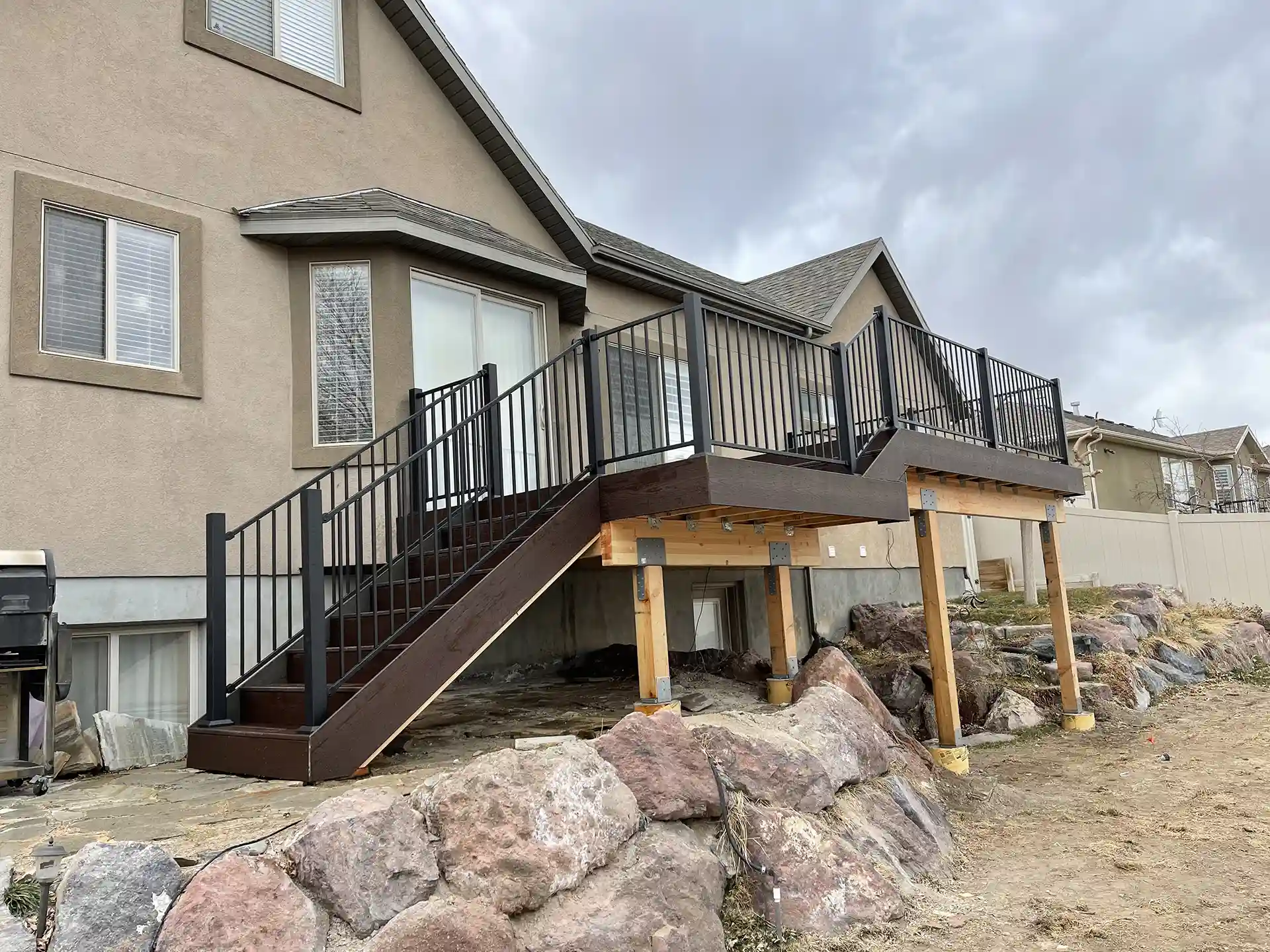 Composite deck with railing in coastal Massachusetts